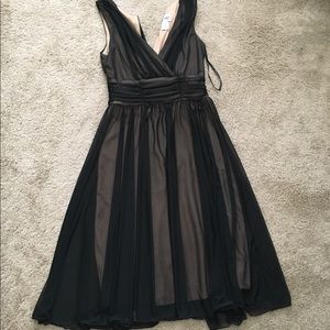 Comfortable formal dress, mid length.